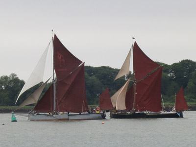 An overtaking manoeuvre on the River Orwell during the Thames Barge Match