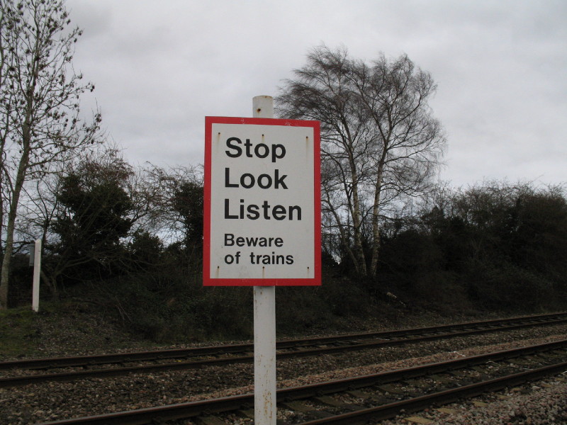 Stop Look Listen railway warning board
