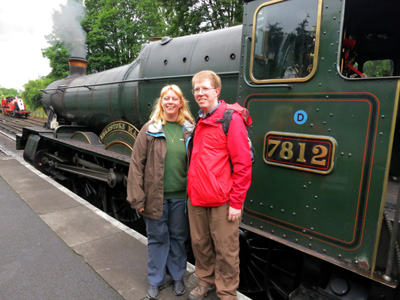 Lucy and Stephen in front of Erlestoke Manor during a 10th wedding anniversary visit to the Severn Valley Railway
